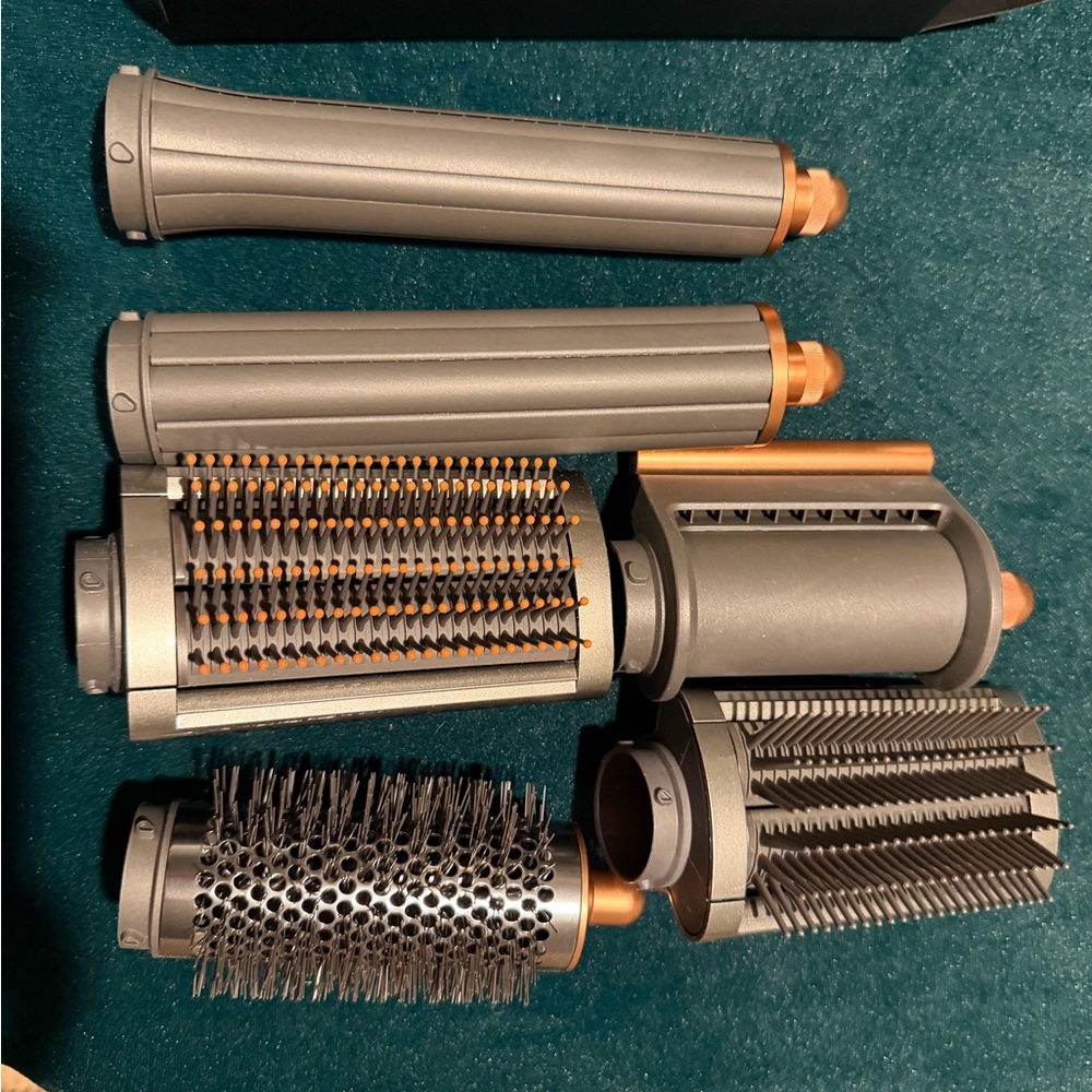 Dyson hair styling attachment set in gray and copper